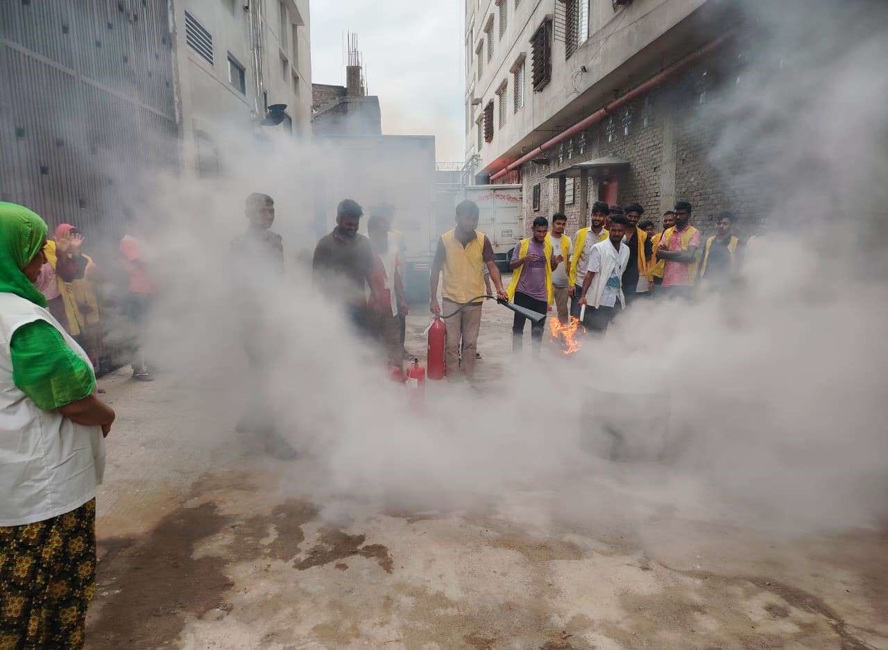 Staff undergoing fire extinguisher training