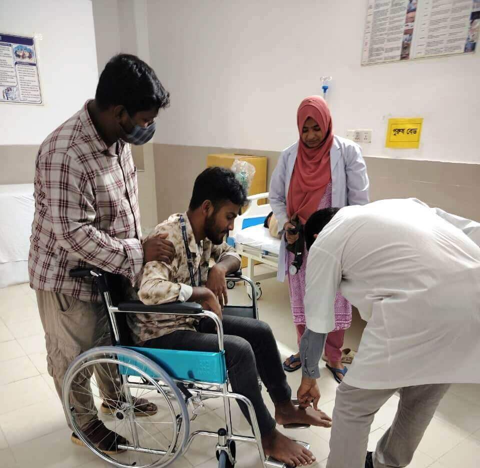 Medical team assisting an employee